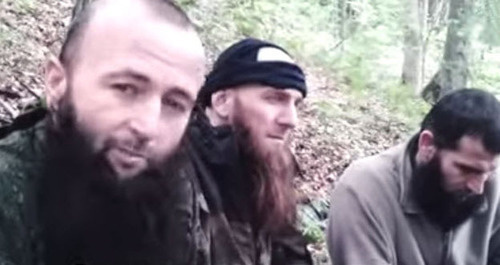 Screenshot from a video record of the burial of Doku Umarov, photo by YouTube user Albert Albertiny.