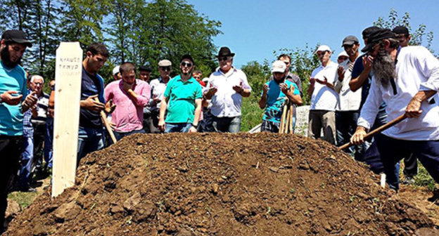 Funeral of Timur Kuashev. Nalchik, Volny Aul, August 2, 2014. Photo by Abdulla Duduev, http://www.facebook.com/abdulla.duduev