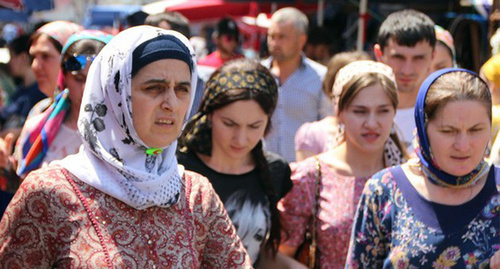 Women in hijabs in the central market of Grozny, July 2014. Photo by Magomed Magomedov for the "Caucasian Knot"