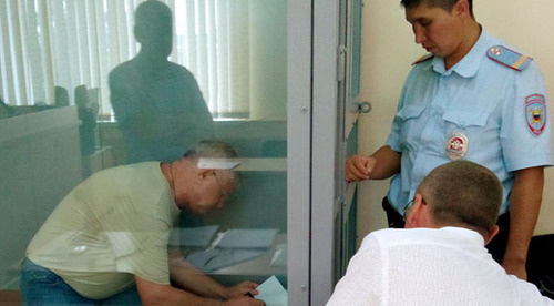 Mikhail Stolyarov (on the left) in the court room, Astrakhan, August 21, 2014. Photo by Elena Grebenyuk for the ‘Caucasian Knot’. 