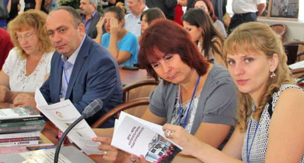 Participants of the second international forum "Children are the victims of terror in recent history: the problem of historical memory" dated to the 10th anniversary of the tragedy in Beslan. North Ossetia, Vladikavkaz, September 3, 2014. Photo by Khariton Kabisov for the ‘Caucaisian Knot’. 