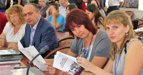 Participants of the second international forum "Children are the victims of terror in recent history: the problem of historical memory" dated to the 10th anniversary of the tragedy in Beslan. North Ossetia, Vladikavkaz, September 3, 2014. Photo by Khariton Kabisov for the ‘Caucaisian Knot’. 