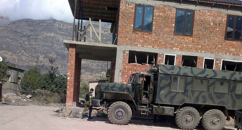 Law enforcers’ car in Vremenny. Photo made by residents of the settlement of Vremenny, Untsukul District of Dagestan, September 24, 2014. 