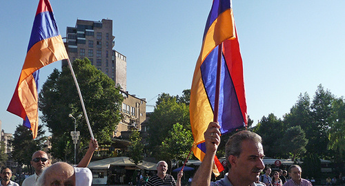 Armenian flags at the protest action in Yerevan, September 2014. Photo by Armine Martirosyan for the "Caucasian Knot"