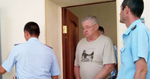 Mikhail Stolyarov (in the centre) in the courtroom. Astrakhan, August 2014. Photo by Yelena Grebenyuk for the "Caucasian Knot"