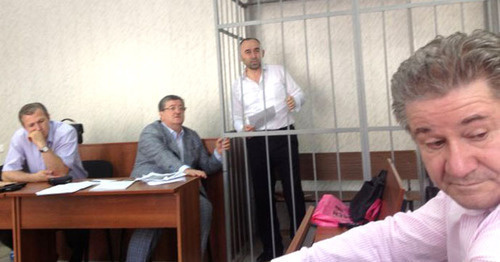 Kurman-Ali Baichorov (in the centre) in the court room. Photo: ANSAR, http://www.ansar.ru/sobcor/2014/08/26/52798" class="main_article_image" src="http://www.kavkaz-uzel.ru/system/uploads/article_image/image/0007/75881/view_new.jpg