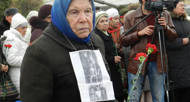 Participant of the rally in commemoration of political repressions victims, Volgograd, October 30, 2014. Photo by Tatiana Filimonova for the ‘Caucasian Knot’.