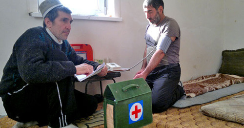 A doctor is measuring blood pressure of a hunger-striker. Karaman, November 2014. Photo by Rasul Magomedov for the "Caucasian Knot"