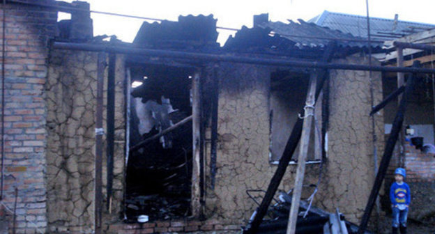 House burned down by law enforcers in the village of Yandi, Achkhoi-Martan District, December 7 2014. Photo provided by the HRC "Memorial" press-service. 