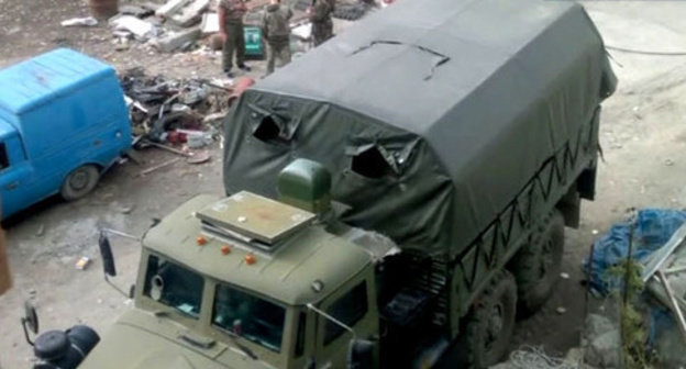 At the place of the special operation in the settlement of Vremenny. The Untsukul District of Dagestan, September 2014. Screenshot of a video by the "Caucasian Knot"