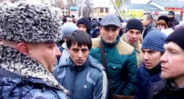 The participants of a people's assembly demanded from the authorities to fairly investigate the murder of a soldier. Minvody, January 24, 2015. Screenshot of a video by the user Roman Novikov http://www.youtube.com/watch?v=80uWjsfv-xk