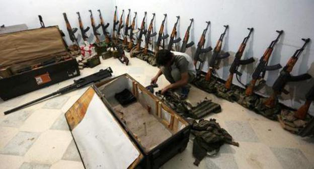 The "Al Sultan Murad Brigady" miltant in the weapons depot in the northern Syria. Photo Khalil Ashawi/ REUTERS