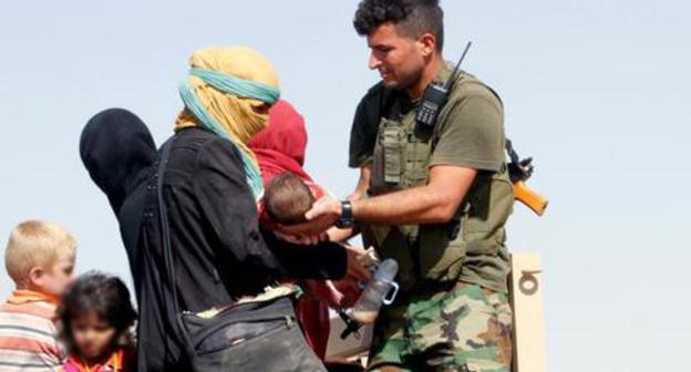Woman with children, Iraq. Photo: REUTERS/Ako Rasheed