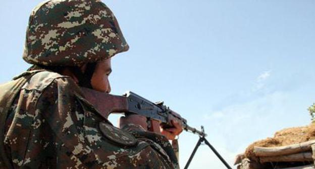 An Armenian soldier in combat position. Photo: © Sputnik/ David Galstyan