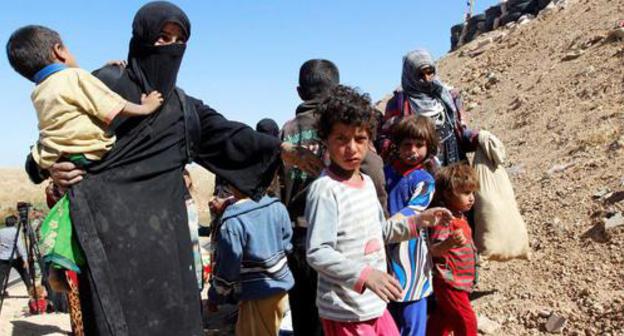 A woman with children in southwestern Kirkuk. Iraq, October 4, 2017. Photo:  REUTERS/АКО Rashid