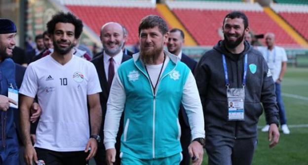 Mohamed Salah, Ramzan Kadyrov and Magomed Daudov (from left to right) visit stadium in Grozny. Photo by provided by press service of the Chechen Parliament, http://www.parlamentchr.ru/press-centre/news/7382-v-groznyj-pribyla-sbornaya-egipta-po-futbolu