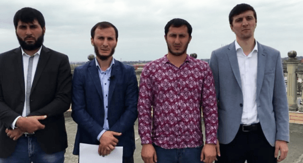 Khasan Katsiev, Bagaudin Khautiev, Ismail Bulguchev and Ismail Nalgiev (from left to right). Screenshot of the activists' video appeal to authorities on Chechnya's territorial claims to Ingushetia, September 4, 2018 https://www.youtube.com/watch?v=CsqZFGulDF8&amp;t=48s" class="main_article_image