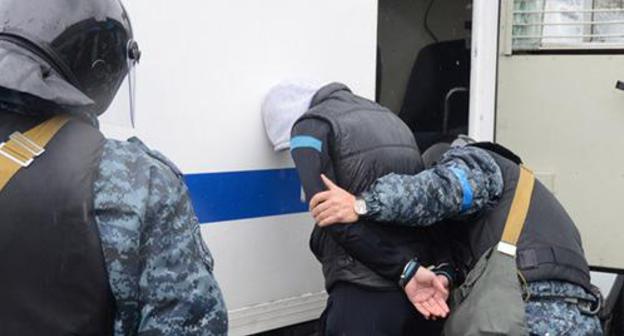 Law enforcers during detention. Photo by the press service of the Russian National Anti-Terrorism Committee http://nac.gov.ru/