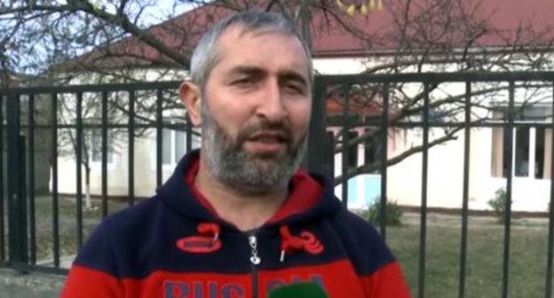 A resident of the Avtury village on the air of the Chechen TV Channel. Photo by  the "Grozny" TV Channel https://www.youtube.com/watch?v=MBdgvNk9imY