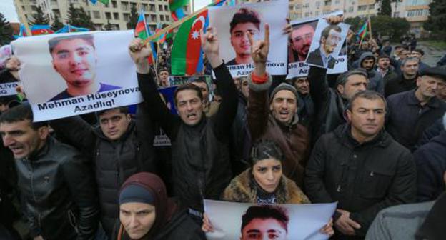 Participants of the oppositional rally hold posters with Mekhman Guseinov's photo. Baku, March 10, 2018. Photo by Aziz Karimov for the "Caucasian Knot"