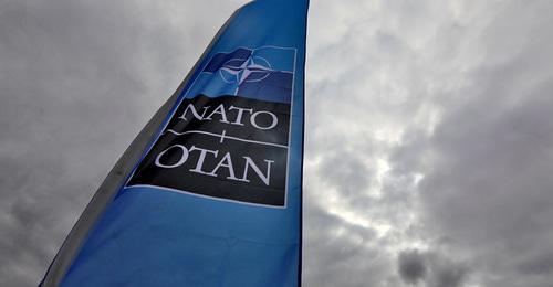 NATO's flag. Photo: REUTERS/Reinhard Krause