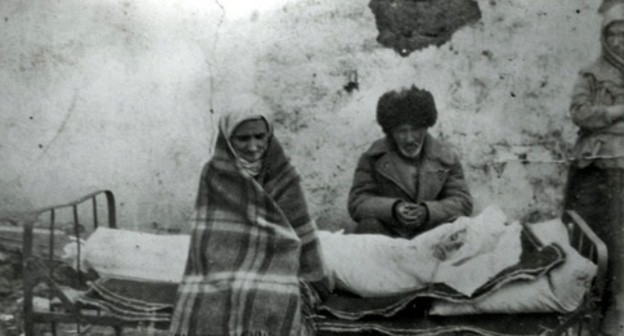 The Ingush family of Gazdiev near the body of their killed daughter. Kazakhstan, 1944. https://ru.wikipedia.org