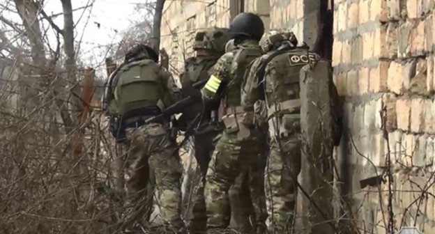 A special operation. Photo by the press service of the Russian National Antiterrorist Committee from the report on the killing of a militant in the village of Belidji, February 19, 2019. http://nac.gov.ru 