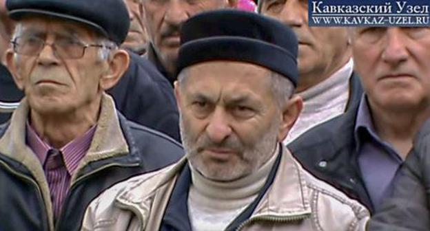 Meeting of the Irganai residents demanding compensation for the land flooded during the construction of a hydroelectric power plant, Dagestan, March 5, 2014. Screenshot from video by the Caucasian Knot: https://www.youtube.com/watch?v=aIbW-mNGJBM