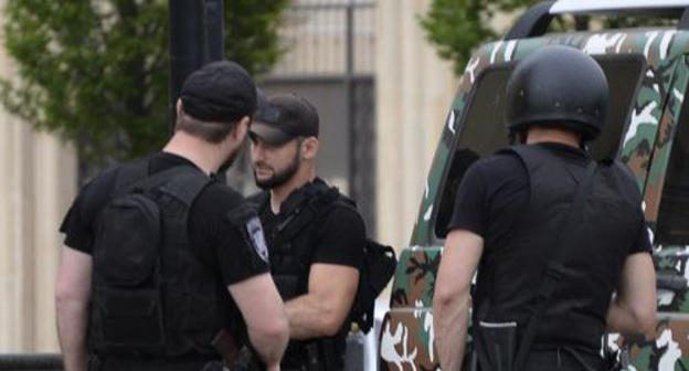 Law enforcers. Photo: REUTERS/Said Tsarnayev