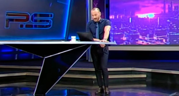 Giorgi Gabuniya during his performance on air. Photo: screenshot of the video by the user ika302008 https://www.youtube.com/watch?time_continue=12&amp;v=lWqAVg_k1Y0