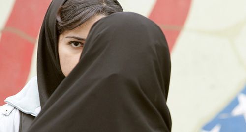 Girls wearing hijabs. Photo: REUTERS/Morteza Nikoubazl (IRAN)