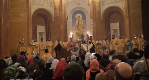 Christmas liturgy in a church in Armenia. Screenshot of the video by Arsen Dallakyan https://youtu.be/yhevTrMGRlQ