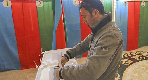 At a polling station in Baku. Photo: REUTERS/Aziz Karimov