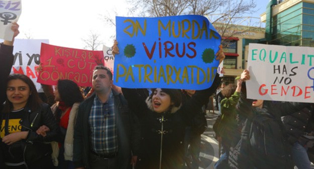 A poster saying, "Patriarchy is the most disgusting virus". Photo by Aziz Karimov for the "Caucasian Knot"