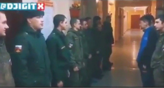 Military servicemen. Screenshot from video posted by Telegram-Channel: https://t.me/mnogonazi/3519