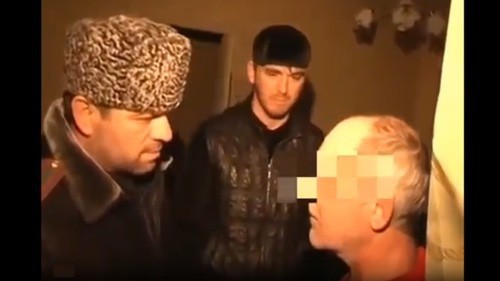 Abushaikh Vismuradov (left). Screenshot from video spread among residents of Chechnya through the WhatsApp messenger