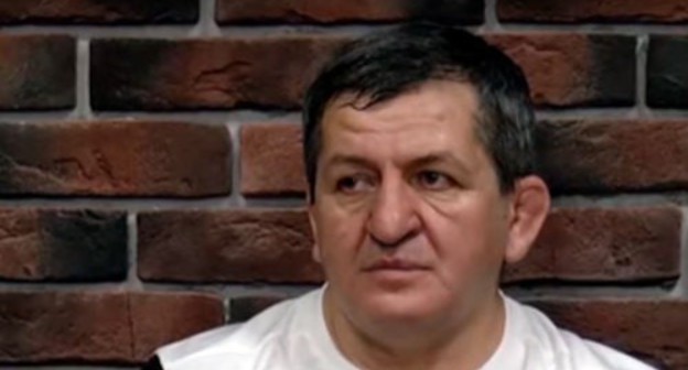 Abdulmanap Nurmagomedov. Screenshot of the video by "Vremya Sporta" https://www.youtube.com/watch?v=HWyclHTd89o