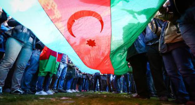 Flag of Azerbaijan at a protest action. Photo by Aziz Karimov for the Caucasian Knot