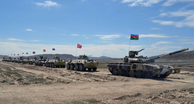 Military vehicles with flags of Azerbaijan and Turkey. Photo: press service of the Ministry of Defence of Azerbaijan