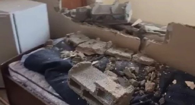 Wall of a building destroyed as a result of shelling attack on Stepanakert. Screenshot from the video posted by the Caucasian Knot