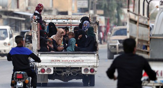 Women and children in the truck. Syria, October 2019. Photo: REUTERS/Khalil Ashawi