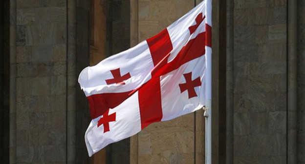 Flag of Georgia near the Parliament building. Photo: REUTERS/David Mdzinarishvili