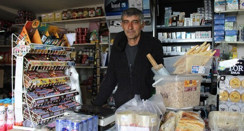 A shop owner in the town of Berdzor. Nagorno-Karabakh, March 21, 2021. Photo by Alvard Grigoryan for the "Caucasian Knot"