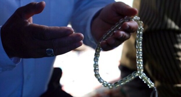 Hands of a Muslim praying. Photo by Aziz Karimov for the Caucasian Knot