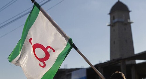 A flag held by a participant of the rally in Magas, October 2018. Photo: REUTERS/Maxim Shemetov