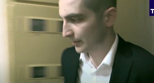 The detention of Georgy Guev. Screenshot of the video by TASS https://www.youtube.com/watch?v=yYQEb5nf0Iw&amp;feature=youtu.be
