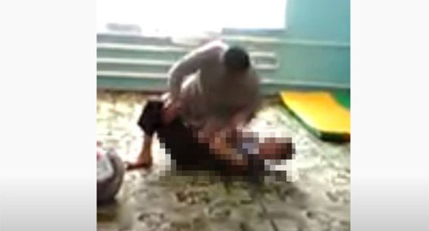 Screenshot of a video of child abuse at a boarding school for mentally retarded children in Ingushetia https://www.youtube.com/watch?v=ZO38aWNwJqM