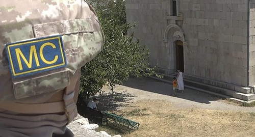 Pilgrims visiting a monastery in Nagorno-Karabakh are accompanied by peacekeepers. Photo mil.ru/russian_peacekeeping_forces/news/more.htm?id=12371357@egNews