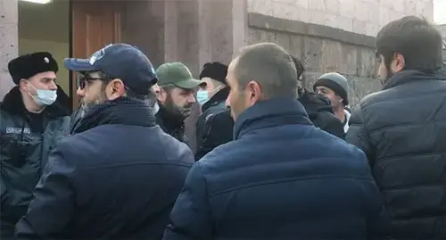 Relatives of captured soldiers near the Armenian parliament. Yerevan, December 8, 2021. Screenshot: https://www.youtube.com/watch?v=JnS6xD3UkMs&t=8s
