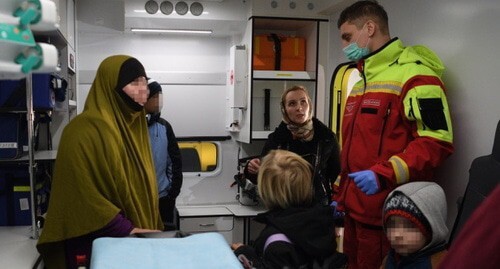 Children evacuated from Syria, Maria Lvova-Belova, the plenipotentiary for children's rights under the Russian President, and a health worker. Photo by the press service of the Russian children's Ombudsperson